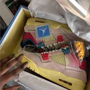 Jordan 4 Retro Union Guava Ice